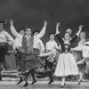 Future choreographer Jerry Mitchell (2L), ice skater John Curry (4L) and dancer Marina Eglevsky (6R) in a scene from the Broadway revival of the musical "Brigadoon"