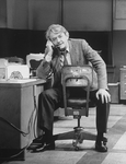 Actor Hal Holbrook talking on the phone in a scene from the NY Shakespeare Festival production of the play "Buried Inside Extra."