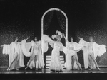 Actor George Hearn (C) in drag with drag performers in a scene from the Broadway production of the musical "La Cage Aux Folles."