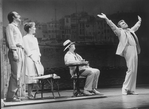 (R-C) Actors Gene Barry and George Hearn with others in a scene from the Broadway production of the musical "La Cage Aux Folles."