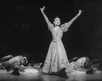 Actress Renee (Zizi) Jeanmaire dancing with others in a scene from the Broadway revival of the musical "Can Can".