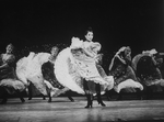 Actress Renee (Zizi) Jeanmaire dancing with others in a scene from the Broadway revival of the musical "Can Can".