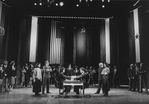 (C, L-R) Actors Judy Kuhn, Dennis Parlato, Philip Casnoff, Paul Harman, unidentified actor, David Carroll, Harry Goz and Marcia Mitzman in a scene from the Broadway production of the musical "Chess.".