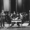(L-R) Actors Judy Kuhn, Dennis Parlato, Philip Casnoff, Paul Harman, unidentified actor, David Carroll, Harry Goz and Marcia Mitzman in a scene from the Broadway production of the musical "Chess.".