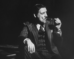 Actor Jerry Orbach smoking a cigar in a scene from the Broadway production of the musical "Chicago.".