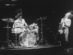 (R-L) Actresses Gwen Verdon (playing saxophone) and Chita Rivera (playing drums) in a scene from the Broadway production of the musical "Chicago.".