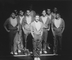 Dancer Sammy Williams flanked by performers who have also played the role he created in the original production, performing at gala performance #3,389 of the Broadway production of the musical "A Chorus Line," making it the longest running show in Broadwayhist. ory.