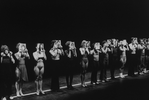 Famous shot of cast holding resume photos in front of their faces from the Broadway production of the musical "A Chorus Line.".