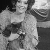 Actress Diana Rigg as French author Colette holding a cat in a scene from the Broadway-bound Seattle, WA production of the musical "Colette"