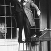 Actor George S. Irving (R) in a scene from the Broadway production of the musical "Copperfield."