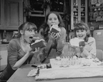 (L-R) Actresses Mary Beth Hurt, Lizbeth Mackay and Mia Dillon with a huge birthday cake in a scene from the Broadway production of the play "Crimes Of The Heart.".