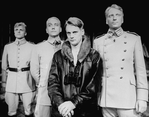 (L-R) Actors Brent Barrett as Wolfram Von Richthofen, Bob Gunton as Hermann Goering, John Vickery as Manfred Von Richthofen and Jeffrey Jones in a scene from the NY Shakespeare Festival production of the musical "The Death Of Von Richthofen As Witnessed. From The Earth."
