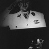 Actor Bob Gunton as Juan Peron under a portrait of the real Peron in a scene from the Broadway production of the musical "Evita.".