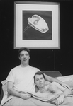 (L-R) Actors Michael Rupert and Stephen Bogardus in bed together in a scene from the Off-Broadway production of the musical "Falsettoland"