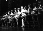 Actor John McMartin (C) performing on a kickline in a scene from the Broadway production of the musical "Follies.".