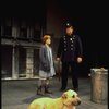 Annie, Sandy and a policeman in a scene from the Toronto production of the musical "Annie."