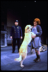 Annie, Sandy and a policeman in a scene from the Toronto production of the musical "Annie."