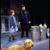 Annie, Sandy and a policeman in a scene from the Toronto production of the musical "Annie."