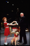 Annie, Sandy and Daddy Warbucks in a scene from the Toronto production of the musical "Annie."