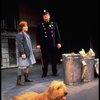 Annie, Sandy and a policeman in a scene from the Toronto production of the musical "Annie."