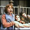 Actress Mary K. Lombardi as Annie w. orphans in a scene from the Detroit production of the musical "Annie."