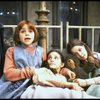 Actress Mary K. Lombardi as Annie w. orphans in a scene from the Detroit production of the musical "Annie."