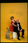 Actress Andrea McArdle as Annie w. Sandy and Reid Shelton as Daddy Warbucks w. comic strip balloons above them; from the Broadway production of the musical "Annie."