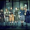 Dorothy Loudon as Miss Hannigan w. orphans incl. Danielle Brisebois in a scene from the Broadway production of the musical "Annie."