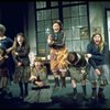 Dorothy Loudon as Miss Hannigan w. orphans incl. Danielle Brisebois in a scene from the Broadway production of the musical "Annie."