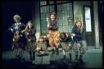 Dorothy Loudon as Miss Hannigan w. orphans incl. Danielle Brisebois in a scene from the Broadway production of the musical "Annie."