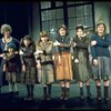 Dorothy Loudon as Miss Hannigan w. orphans incl. Danielle Brisebois in a scene from the Broadway production of the musical "Annie."