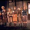 Dorothy Loudon as Miss Hannigan (2L) w. orphans incl. Danielle Brisebois (L) in a scene from the Broadway production of the musical "Annie."