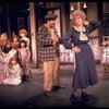 R) Dorothy Loudon as Miss Hannigan w. orphans incl. (3L) Andrea McArdle as Annie and (6L) Danielle Brisebois in a scene from the Broadway musical "Annie."