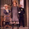 Actresses Andrea McArdle as Annie and Dorothy Loudon as Miss Hannigan (L) w. a policeman in a scene from the Broadway production of the musical "Annie."