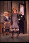 Actresses Andrea McArdle as Annie and Dorothy Loudon as Miss Hannigan (L) w. a policeman in a scene from the Broadway production of the musical "Annie."