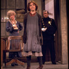 Actresses Andrea McArdle as Annie (C) and Dorothy Loudon as Miss Hannigan (L) with a policeman in a scene from the Broadway production of the musical "Annie.".