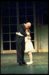 Actors Reid Shelton as Daddy Warbucks and Andrea McArdle as Annie in a scene from the Broadway production of the musical "Annie."