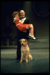 Actors Reid Shelton as Daddy Warbucks and Andrea McArdle as Annie w. Sandy in a scene from the Broadway production of the musical "Annie."