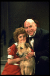 Actors Reid Shelton as Daddy Warbucks and Andrea McArdle as Annie w. Sandy in a scene from the Broadway production of the musical "Annie."