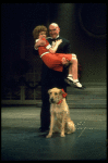 Actors Reid Shelton as Daddy Warbucks and Andrea McArdle as Annie w. Sandy in a scene from the Broadway production of the musical "Annie."