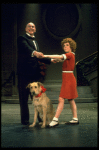 Actors Reid Shelton as Daddy Warbucks and Andrea McArdle as Annie w. Sandy in a scene from the Broadway production of the musical "Annie."