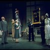 Actors Reid Shelton as Daddy Warbucks (2R) and Sandy Faison as Grace (3R) in a scene from the Broadway production of the musical "Annie."