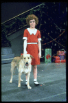 Actress Andrea McArdle as Annie w. Sandy in a scene from the Broadway production of the musical "Annie."