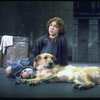 Actress Andrea McArdle as Annie w. Sandy in a scene from the Broadway production of the musical "Annie."