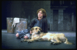 Actress Andrea McArdle as Annie w. Sandy in a scene from the Broadway production of the musical "Annie."