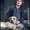 Actress Andrea McArdle as Annie w. Sandy in a scene from the Broadway production of the musical "Annie."