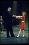 Actors Andrea McArdle as Annie, Sandy Faison as Grace and Reid Shelton as Daddy Warbucks in a scene from the Broadway production of the musical "Annie."