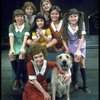 Actress Andrea McArdle as Annie w. Sandy, Danielle Brisebois and orphans in a scene from the Broadway production of the musical "Annie."