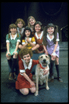 Actress Andrea McArdle as Annie w. Sandy, Danielle Brisebois and orphans in a scene from the Broadway production of the musical "Annie."