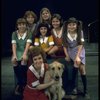 Actress Andrea McArdle as Annie w. Sandy, Danielle Brisebois and orphans in a scene from the Broadway production of the musical "Annie."